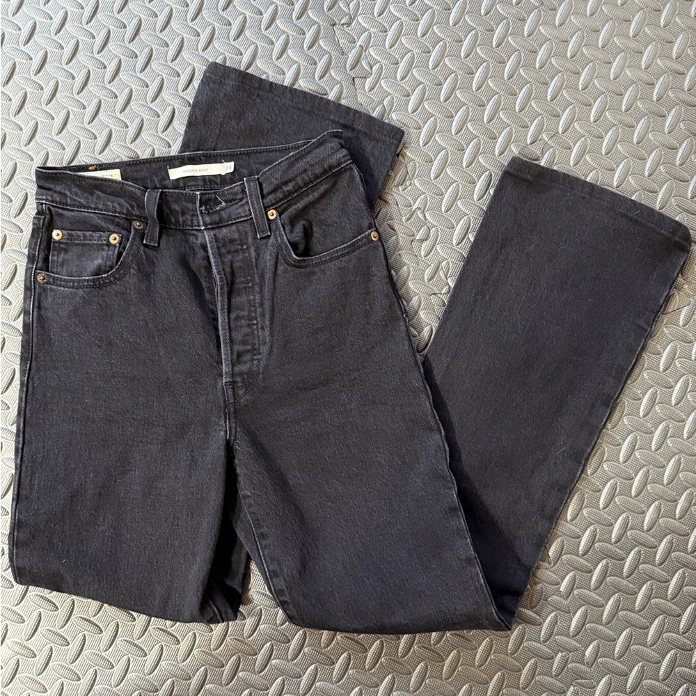Levi’s black denim bell bottom jeans. Ribcage boot 24
